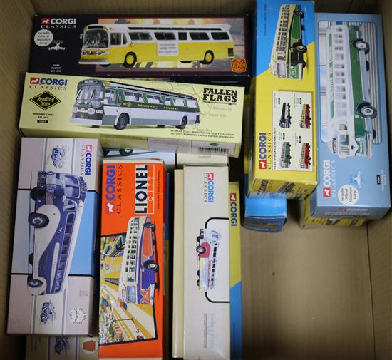 A collection of Corgi boxed coaches and buses